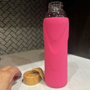 Origins Pink Glass Bottle with Bamboo Lid